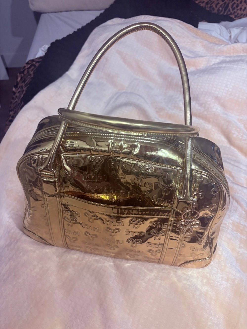 WATERPROOF METALLIC GOLD TNA BAG